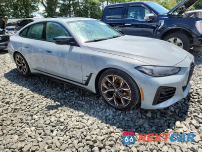 Czwarte zdjęcie samochodu z boku: 2024 BMW M440XI GRAN COUPE VIN:WBA13AW03RFS04128 - miniatura