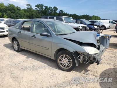 Czwarte zdjęcie samochodu z boku: 2005 FORD FOCUS ZX4 VIN:1FAFP34N45W228705 - miniatura