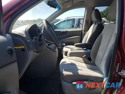 Zdjęcie 7 z 13 samochodu: 2014 KIA SEDONA LX VIN:KNDMG4C7XE6577779 - miniatura