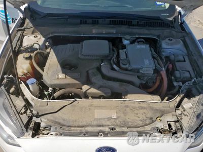 Zdjęcie 11 z 12 samochodu: 2018 FORD FUSION SE HYBRID VIN:3FA6P0LU1JR171822 - miniatura