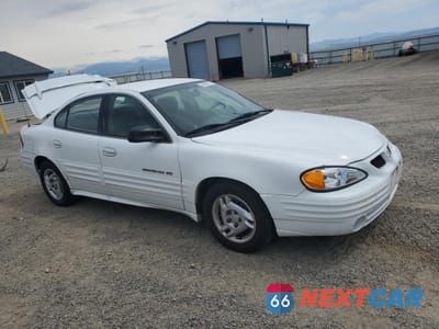 Czwarte zdjęcie samochodu z boku: 2001 PONTIAC GRAND AM SE1 VIN:1G2NF52T71C210737 - miniatura