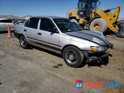 Czwarte zdjęcie samochodu z boku: 1996 TOYOTA COROLLA VIN:1NXBA02E4TZ370245 - miniatura