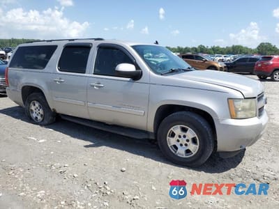 Czwarte zdjęcie samochodu z boku: 2007 CHEVROLET SUBURBAN C1500 VIN:3GNFC16JX7G132980 - miniatura