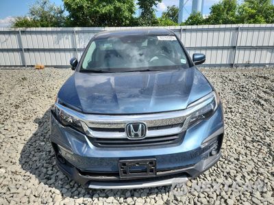 Piąte zdjęcie samochodu w środku: 2021 HONDA PILOT EXL VIN:5FNYF6H54MB031392 - miniatura