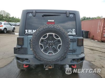 Zdjęcie 6 z 14 samochodu: 2013 JEEP WRANGLER UNLIMITED RUBICON VIN:1C4HJWFG5DL651426 - miniatura
