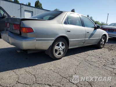 Trzecie zdjęcie samochodu z tyłu: 2001 TOYOTA CAMRY CE VIN:JT2BG22K710562583 - miniatura
