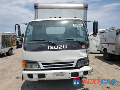 Piąte zdjęcie samochodu w środku: 1997 ISUZU NPR VIN:4KLB4B1R9VJ002207 - miniatura