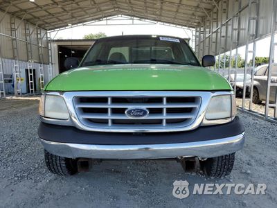 Piąte zdjęcie samochodu w środku: 1999 FORD F150 VIN:1FTZF1729XNC27249 - miniatura