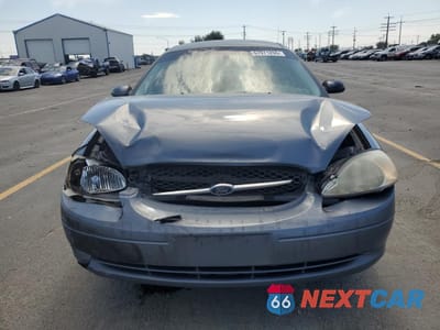 Piąte zdjęcie samochodu w środku: 2000 FORD TAURUS SES VIN:1FAFP5524YG152806 - miniatura