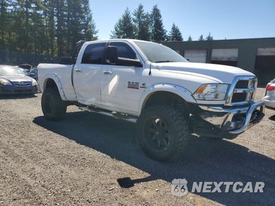 Czwarte zdjęcie samochodu z boku: 2014 RAM 2500 SLT VIN:3C6UR5DL5EG186931 - miniatura
