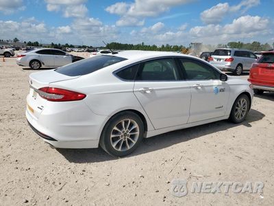 Trzecie zdjęcie samochodu z tyłu: 2017 FORD FUSION SE HYBRID VIN:3FA6P0LU5HR409035 - miniatura