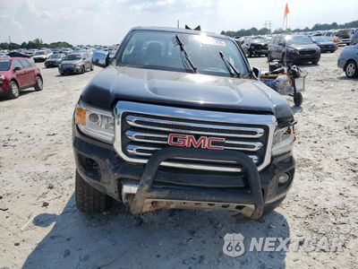 Piąte zdjęcie samochodu w środku: 2016 GMC CANYON SLT VIN:1GTG6DE34G1253642 - miniatura