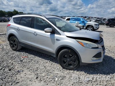Czwarte zdjęcie samochodu z boku: 2016 FORD ESCAPE SE VIN:1FMCU9G96GUB10334 - miniatura