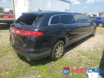 Trzecie zdjęcie samochodu z tyłu: 2013 LINCOLN MKT VIN:2L1MJ5LK8DBL58375 - miniatura