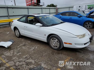 Czwarte zdjęcie samochodu z boku: 2000 SATURN SC2 VIN:1G8ZY1277YZ148504 - miniatura