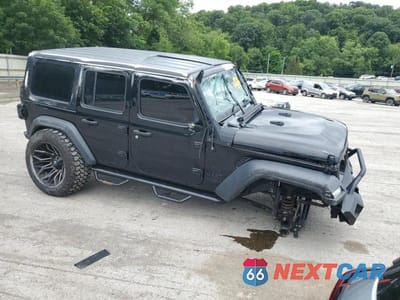 Czwarte zdjęcie samochodu z boku: 2021 JEEP WRANGLER UNLIMITED SPORT VIN:1C4HJXDN3MW863747 - miniatura