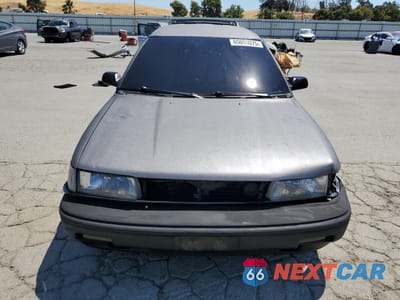 Piąte zdjęcie samochodu w środku: 1991 TOYOTA COROLLA DLX VIN:JT2AE94K1M3460304 - miniatura