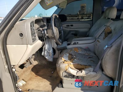 Zdjęcie 7 z 13 samochodu: 2002 GMC YUKON XL C1500 VIN:1GKEC16Z42J158660 - miniatura