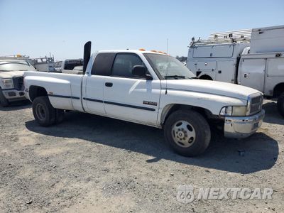 Czwarte zdjęcie samochodu z boku: 1999 DODGE RAM 3500 VIN:1B7MC3361XJ574735 - miniatura