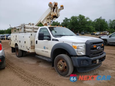 Czwarte zdjęcie samochodu z boku: 2015 FORD F450 SUPER DUTY VIN:1FDUF4HY5FEA17000 - miniatura