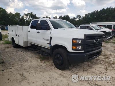 Czwarte zdjęcie samochodu z boku: 2021 CHEVROLET SILVERADO MEDIUM DUTY VIN:1HTKHPVK0MH632804 - miniatura