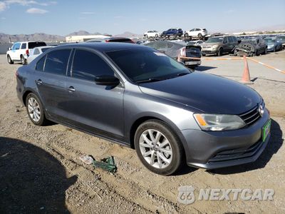 Czwarte zdjęcie samochodu z boku: 2015 VOLKSWAGEN JETTA SE VIN:3VWD17AJ2FM257971 - miniatura