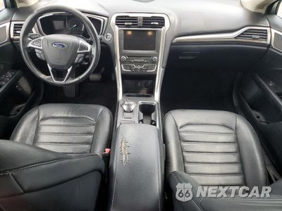 Zdjęcie 8 z 12 samochodu: 2017 FORD FUSION SE HYBRID VIN:3FA6P0LUXHR409533 - miniatura