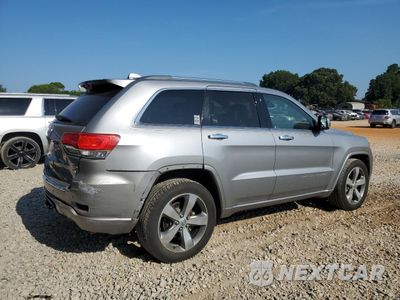 Trzecie zdjęcie samochodu z tyłu: 2014 JEEP GRAND CHEROKEE OVERLAND VIN:1C4RJECGXEC221685 - miniatura