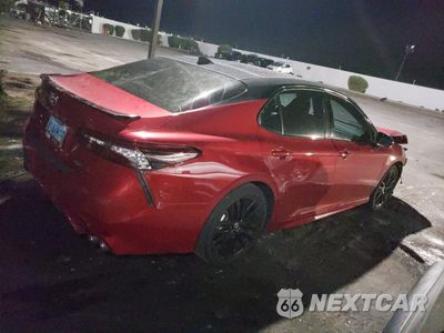 Trzecie zdjęcie samochodu z tyłu: 2024 TOYOTA CAMRY XSE VIN:4T1K61AK1RU202814 - miniatura