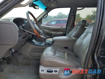 Zdjęcie 7 z 13 samochodu: 2001 LINCOLN NAVIGATOR VIN:5LMFU28A11LJ00804 - miniatura