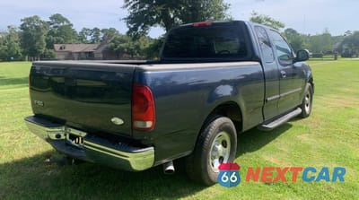 Czwarte zdjęcie samochodu z boku: 2002 FORD F150 VIN:1FTRX17W72NB36764 - miniatura