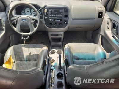 Zdjęcie 8 z 13 samochodu: 2001 FORD ESCAPE XLS VIN:1FMYU01101KB29324 - miniatura