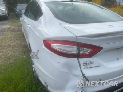 Trzecie zdjęcie samochodu z tyłu: 2016 FORD FUSION SE VIN:3FA6P0HD7GR319540 - miniatura
