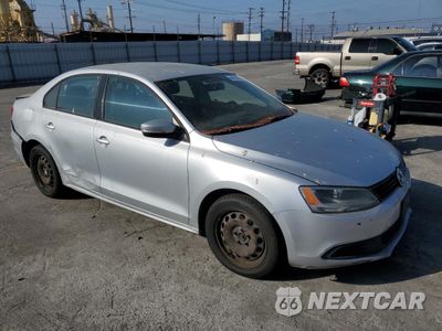 Czwarte zdjęcie samochodu z boku: 2014 VOLKSWAGEN JETTA SE VIN:3VWD17AJ1EM362788 - miniatura