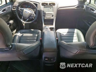 Zdjęcie 8 z 12 samochodu: 2017 FORD FUSION SE HYBRID VIN:3FA6P0LU3HR409020 - miniatura