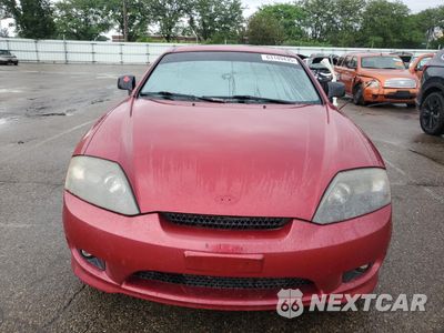Piąte zdjęcie samochodu w środku: 2005 HYUNDAI TIBURON GT VIN:KMHHN65F25U164141 - miniatura