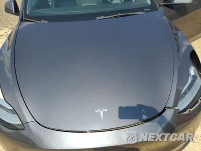 Zdjęcie 12 z 14 samochodu: 2022 TESLA MODEL Y VIN:7SAYGDEE3NF440185 - miniatura