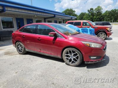 Czwarte zdjęcie samochodu z boku: 2017 FORD FOCUS SEL VIN:1FADP3H25HL337011 - miniatura