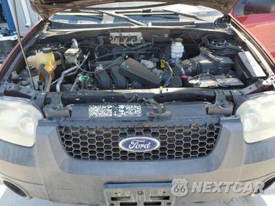 Zdjęcie 12 z 13 samochodu: 2007 FORD ESCAPE XLT VIN:1FMYU931X7KA16328 - miniatura