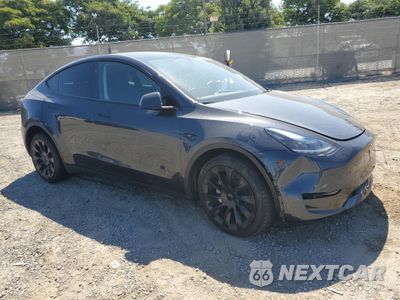 Czwarte zdjęcie samochodu z boku: 2024 TESLA MODEL Y VIN:7SAYGDED0RF096554 - miniatura