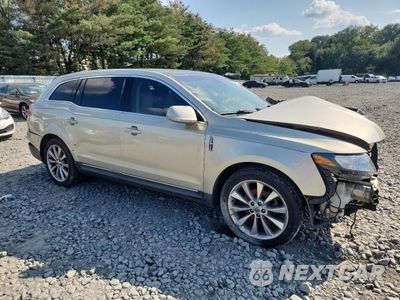 Czwarte zdjęcie samochodu z boku: 2010 LINCOLN MKT VIN:2LMHJ5AT6ABJ26658 - miniatura
