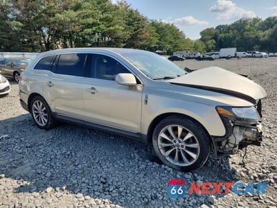 Czwarte zdjęcie samochodu z boku: 2010 LINCOLN MKT VIN:2LMHJ5AT6ABJ26658 - miniatura