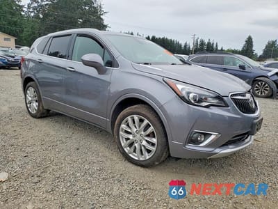 Czwarte zdjęcie samochodu z boku: 2019 BUICK ENVISION PREMIUM VIN:LRBFX3SX3KD039886 - miniatura