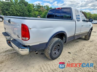Trzecie zdjęcie samochodu z tyłu: 1999 FORD F150 VIN:1FTRX18W4XNA79350 - miniatura
