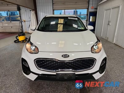 Piąte zdjęcie samochodu w środku: 2021 KIA SPORTAGE LX VIN:KNDPMCAC2M7848777 - miniatura