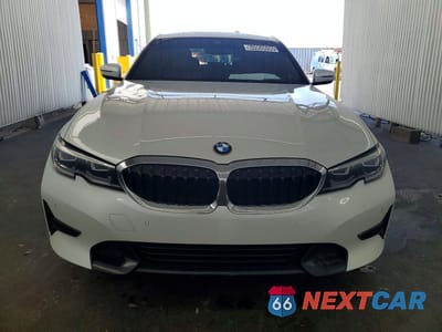 Piąte zdjęcie samochodu w środku: 2021 BMW 330I VIN:3MW5R1J07M8C11527 - miniatura