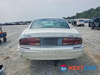 Zdjęcie 6 z 13 samochodu: 2000 BUICK PARK AVENUE ULTRA VIN:1G4CU5217Y4156508 - miniatura