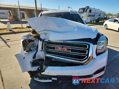 Piąte zdjęcie samochodu w środku: 2018 GMC YUKON SLT VIN:1GKS2BKC8JR388649 - miniatura