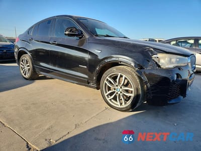Czwarte zdjęcie samochodu z boku: 2016 BMW X4 XDRIVE35I VIN:5UXXW5C58G0N92953 - miniatura
