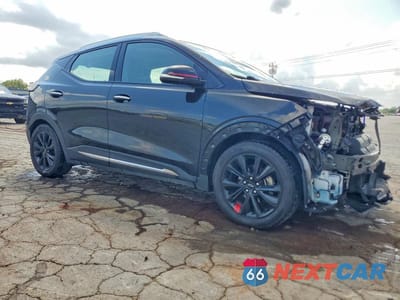 Czwarte zdjęcie samochodu z boku: 2023 CHEVROLET BOLT EUV PREMIER VIN:1G1FZ6S01P4127674 - miniatura